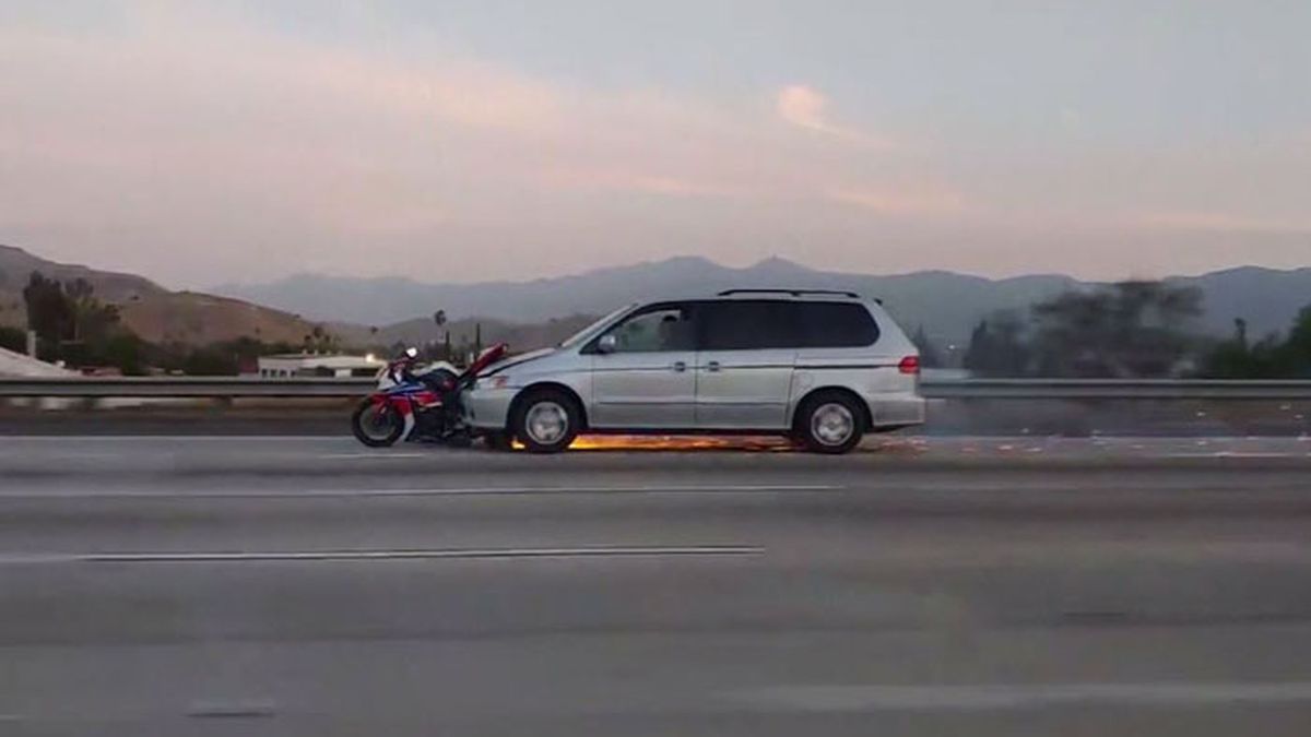 Driver accused of speeding away from hit-and-run with motorcycle on front bumper